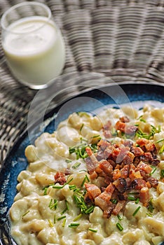 Potato dumplings with sheep cheese and bacon, traditional slovakian food, slovak gastronomy