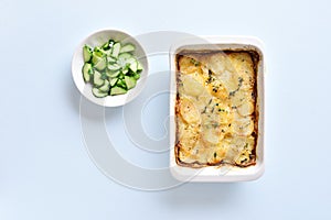 Potato gratin in baking dish