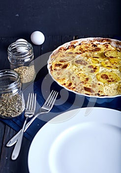 Potato gratin with cream, eggs and cheese