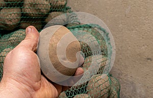 Potato in hand, winter supplies