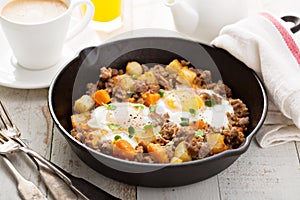 Potato hash with eggs