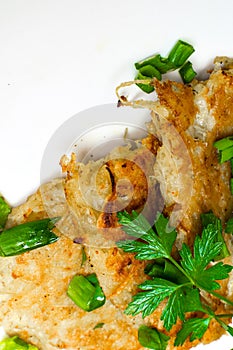 Potato latkes jewish pancakes with parsley. Hannukah celebration dish concept. copy space