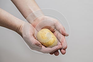 Potato Lover: Caucasian man Holding a Melody Potato