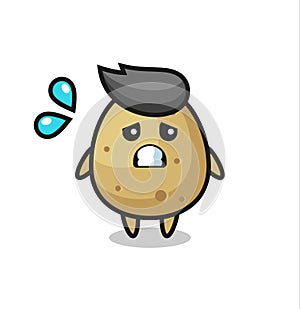 Potato mascot character with afraid gesture