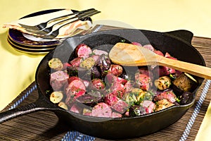 Potato medley meal cooked in a cast iron pan