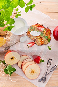 Potato pancakes with apfel and strawberry photo