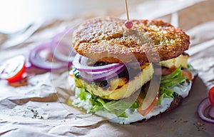 Potato pancakes with fried cheese, vegetables