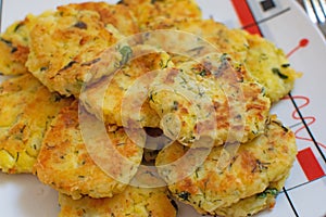 Potato pancakes with green onions. Draniki - potato fritters. The naitonal dish of Belarus, Ukraine and Russia. Potato zucchini