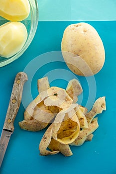 Potato Peelings on a Blue Background
