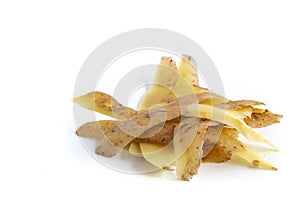 Potato peelings on white  background photo