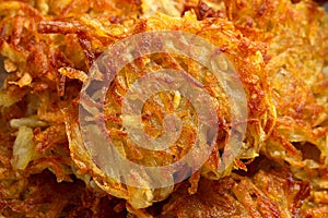 Potato rosti or hash brown close up, background