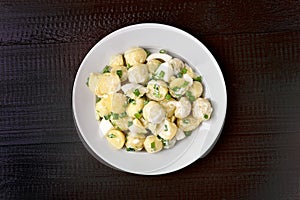 Potato salad with eggs and green onion