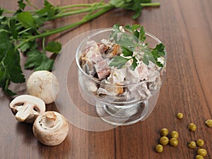 Potato salad with marinated mushrooms, sausage and onion