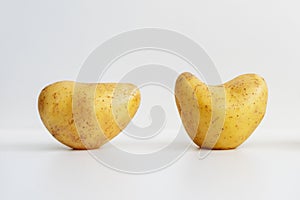 Potato in the shape of a heart. Nature romance.