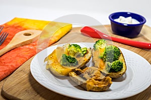 Potato Skins appetizer with broccoli and cheddar cheese