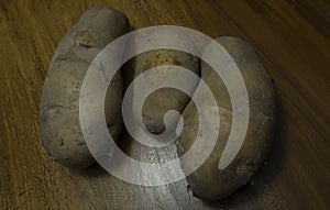 Potato vegetable . Fresh organic dirty potatoes.