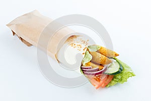 Tasty lavash rolls with potato and vegetables, isolated on white. menu photo