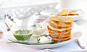 Potatoe pancakes with three dips photo