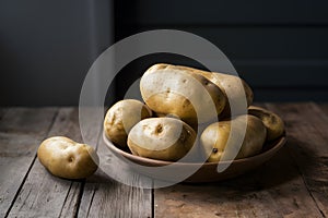 Potatoes displayed on indoor kitchen table, fresh and versatile