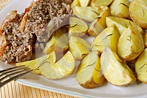 Potatoes roasted and meatloaf