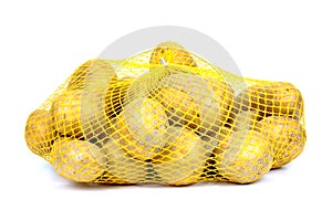 Potatoes in string-bag, Isolated,