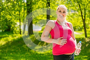 Potbellied pregnant woman happy portrait