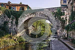 Potes mediaeval town with bridge and Deva river in its path.
