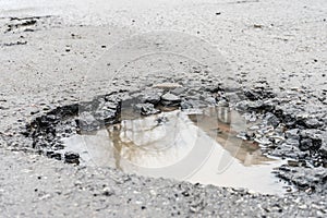 Potholes. Potholes dangerous to motorists and pedestrians. photo