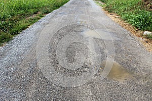 Potholes in a rural unpaved road