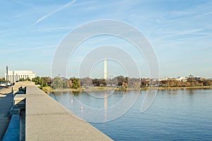 Potomac River Calm Waters and Washington Monument in Background. Arlington Bridge Leads to Lincoln Memorial Washington DC, USA