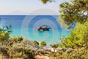POTOS, THASSOS GREECE, 03 SEPTEMBER 2016 Small beach Potos in Greek island Thassos, with boat on sea on 03 september on Thassos