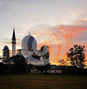 a potrait of abdullah fahmi mosque