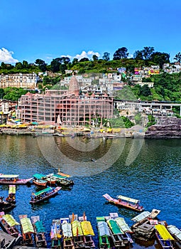 Potrait image of Omkareshwar Jyotirlinga a shiv temple on Omkar mountain an island in Narmada, Madhyapradesh, India photo