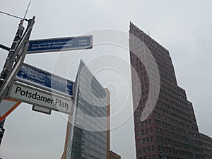 Potsdammer Platz in Berlin, Germany. At foreground sign with street name.