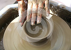 The potter's hands.