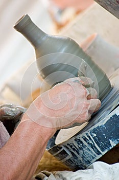 Potter's hands at work photo