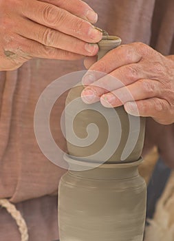 The potter's hands at work