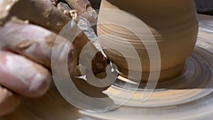 Potter`s Hands Work with Clay on a Potter`s Wheel. Slow Motion