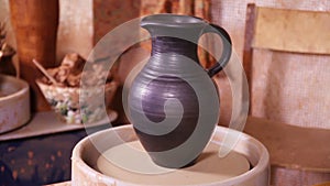 Potter's jug rotating