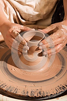 Potter Shaping Clay