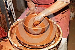 Potter working