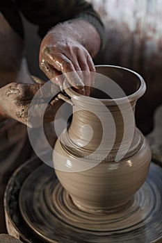 Potter working a piece of clay