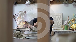 Potter working in the pottery working place