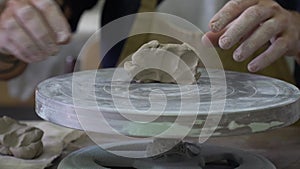 Potter working in the stylish pottery working place