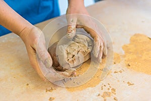 Pottering - creating a clay cup in process