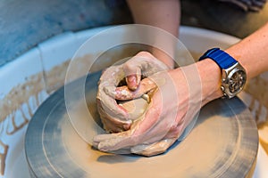 Pottering - creating a clay cup in process