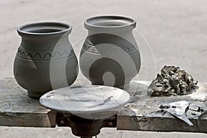 Fresh made pottery and potter wheel