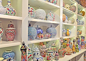 Pottery, ceramic vases, decorated with various patterns, are sol