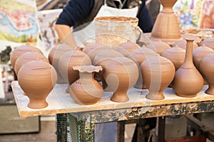 Pottery. Craft, handicraft. Clay pots are sold on street