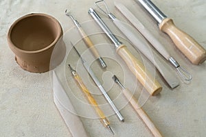 Pottery craft tools for sculpting clay art. View from above.